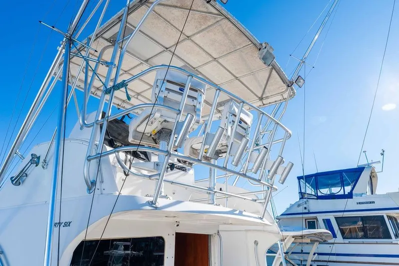  Yacht Photos Pics 2004 Luhrs 36 Convertible boat with flybridge and fishing rod holders.