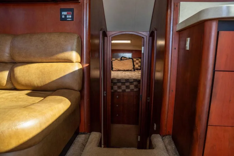  Yacht Photos Pics Interior of 2004 Luhrs 36 Convertible yacht with cozy cabin and leather seating.