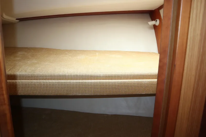  Yacht Photos Pics 2005 Luhrs 38 Convertible cabin interior with a cozy bunk bed.