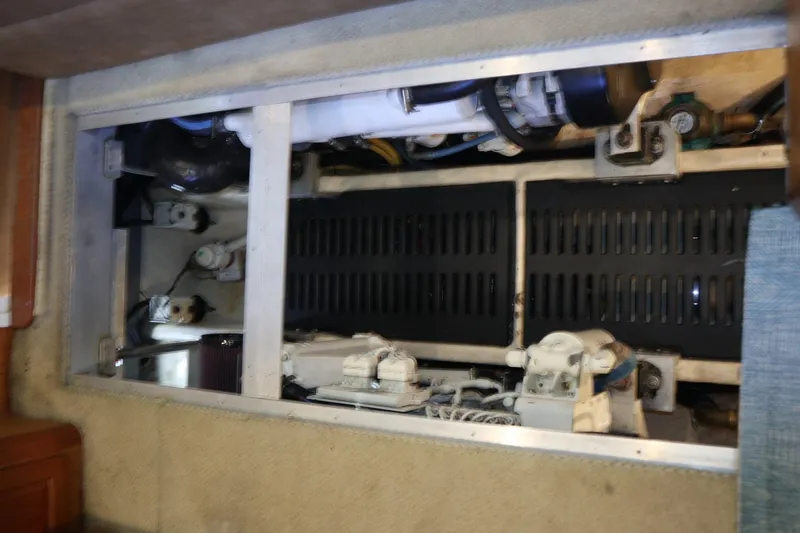  Yacht Photos Pics Engine compartment of 2005 Luhrs 38 Convertible boat, showcasing mechanical components.