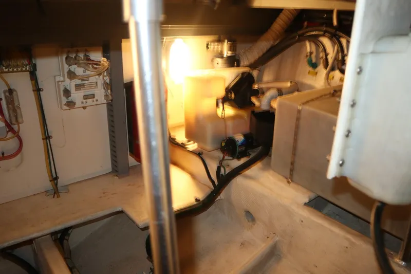  Yacht Photos Pics Engine room of 2005 Luhrs 38 Convertible boat, showing electrical and mechanical components.