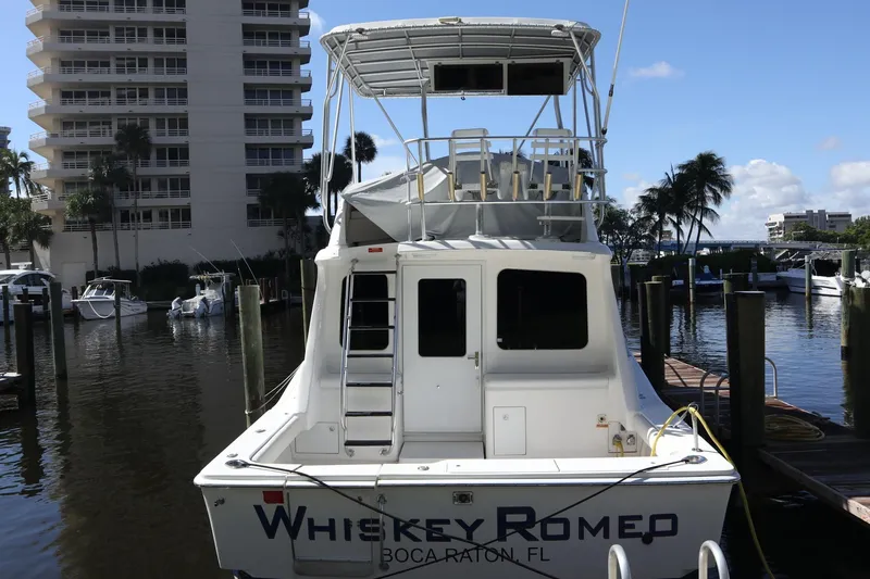  Yacht Photos Pics 2005 Luhrs 38 Convertible yacht docked in marina, Boca Raton, Florida.