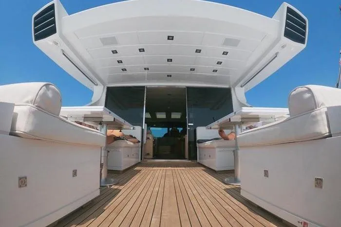  Yacht Photos Pics Luxury 2008 Mangusta 80 yacht deck with sleek seating and modern design.
