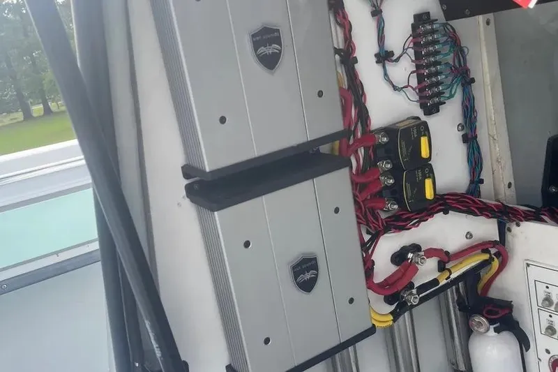  Yacht Photos Pics Electrical system of a 2011 Contender 32 ST boat, featuring wiring and components.