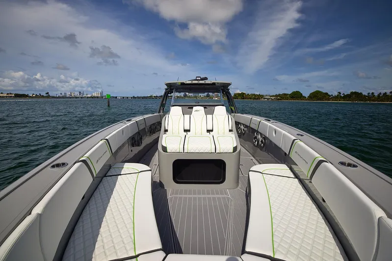  Yacht Photos Pics 2022 Midnight Express 43' Solstice boat with luxurious seating on open water.