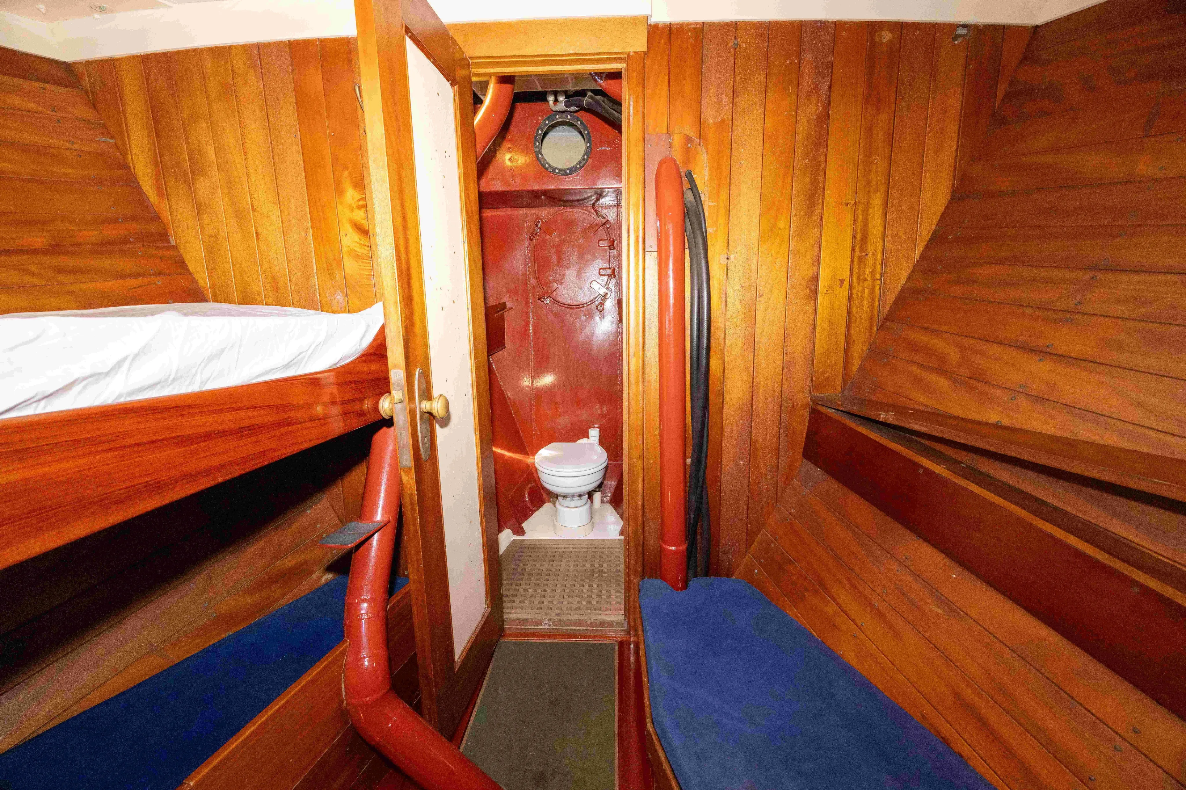 Little Vigilant Yacht Photos Pics crew cabin with view forward to crew shower head
