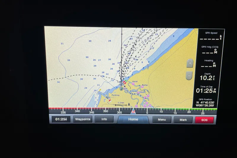  Yacht Photos Pics Navigation display on a 2003 Sea Ray 340 Sundancer showing depth and GPS coordinates.