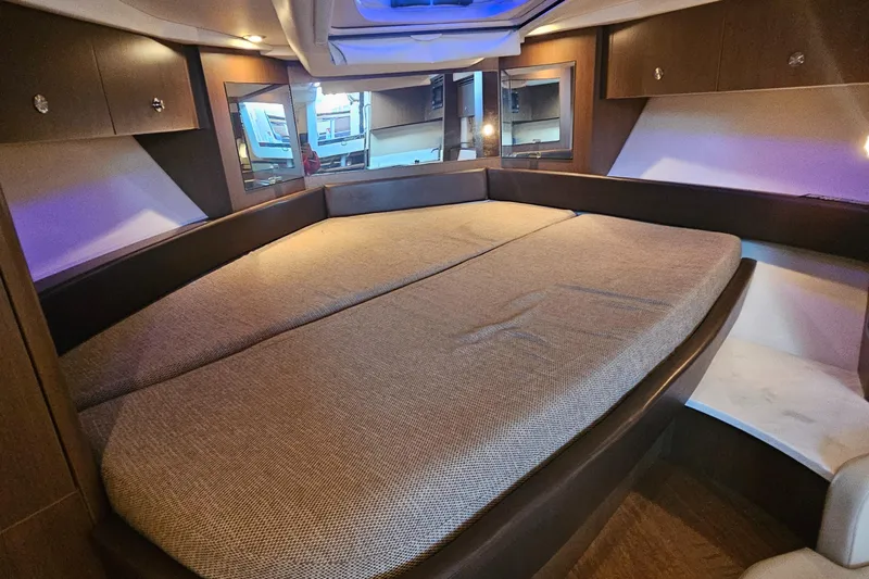 Levon II Yacht Photos Pics 2017 Sea Ray Sundancer 350 Coupe interior cabin with spacious bed and modern design.