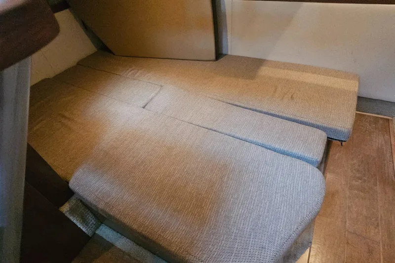 Levon II Yacht Photos Pics 2017 Sea Ray Sundancer 350 Coupe interior with beige cushioned seating.