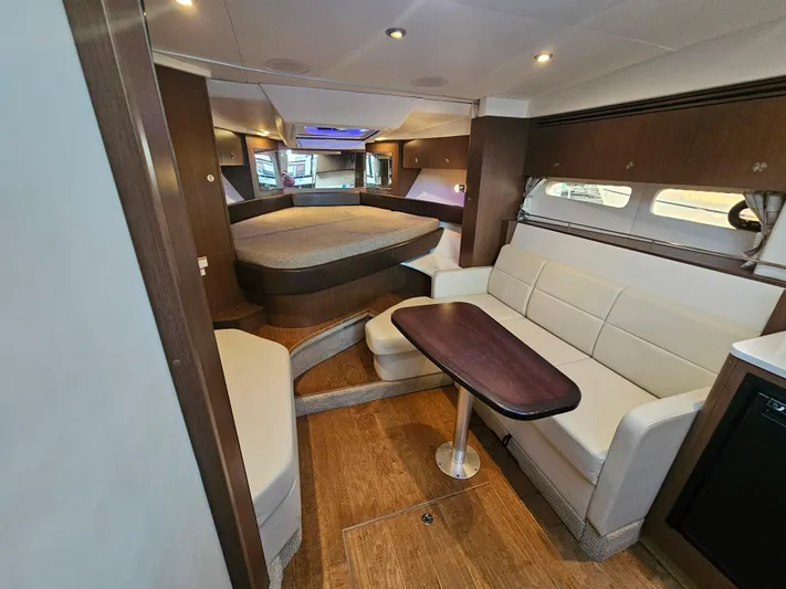 Levon II Yacht Photos Pics Interior of 2017 Sea Ray Sundancer 350 Coupe with modern seating and wood accents.