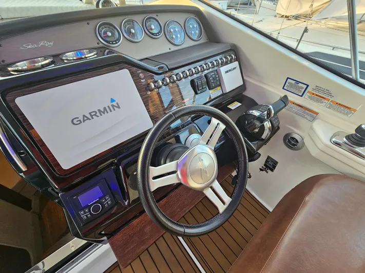 Levon II Yacht Photos Pics Helm of 2017 Sea Ray Sundancer 350 Coupe with Garmin navigation system.