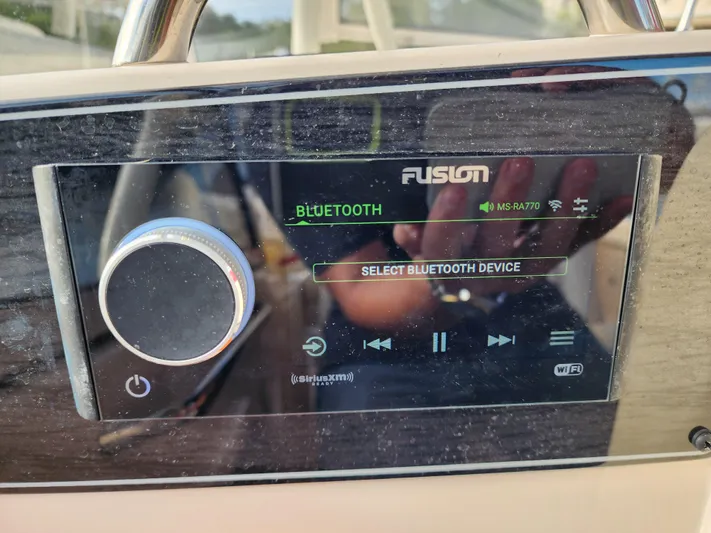  Yacht Photos Pics Fusion Bluetooth audio system on 2023 Grady-White Freedom 275 boat dashboard.
