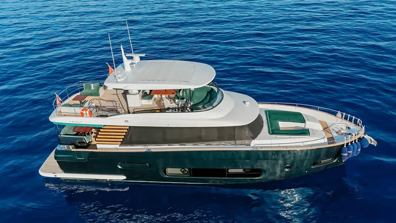  Yacht Photos Pics 2024 Azimut Magellano 66 yacht cruising on open blue sea.