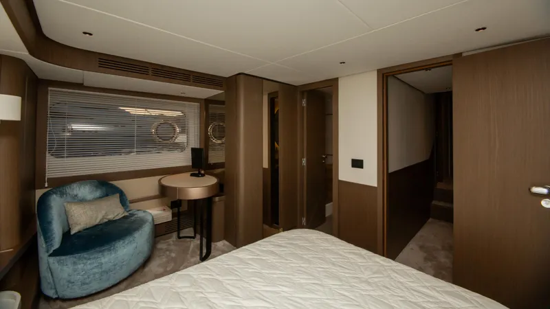  Yacht Photos Pics Luxurious interior of 2024 Azimut Magellano 66 yacht cabin with modern furnishings.