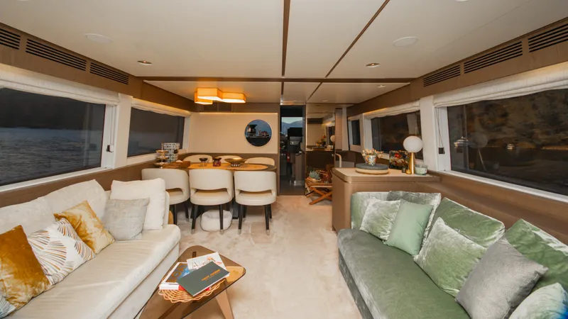  Yacht Photos Pics Luxurious interior of 2024 Azimut Magellano 66 yacht with elegant seating and dining area.