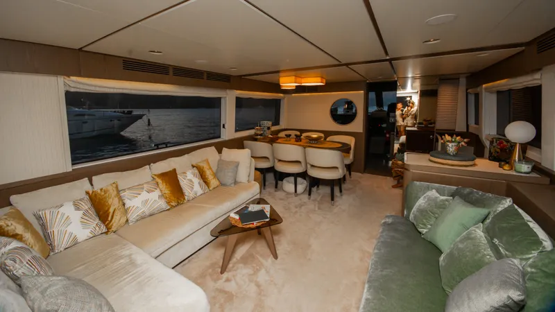  Yacht Photos Pics Luxurious interior of 2024 Azimut Magellano 66 yacht with elegant seating and dining area.