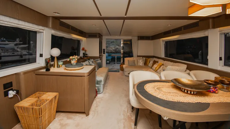 Yacht Photos Pics Luxurious interior of 2024 Azimut Magellano 66 yacht, featuring elegant seating and modern decor.