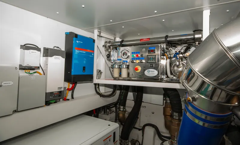  Yacht Photos Pics Engine room of 2024 Azimut Magellano 66 yacht, featuring advanced machinery and equipment.