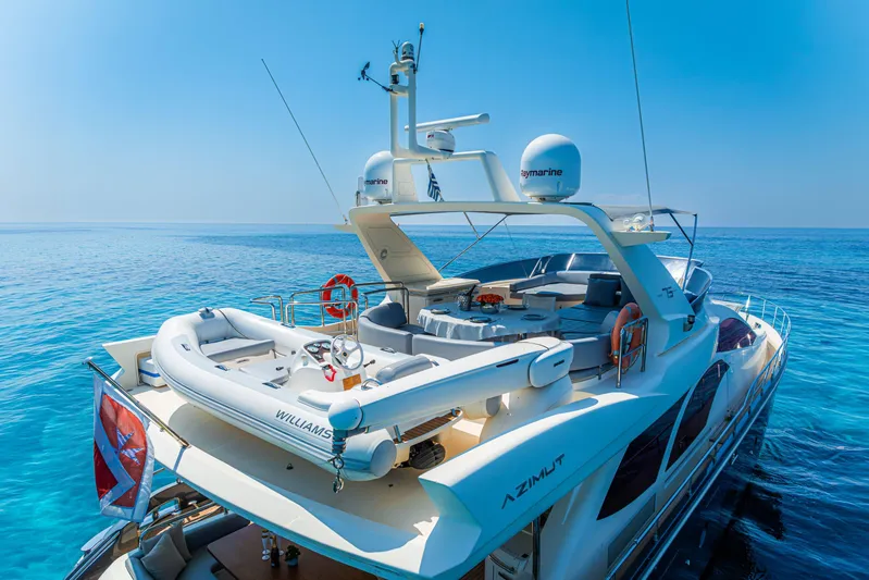 Vea Yacht Photos Pics Luxury 2008 Azimut 75 yacht on clear blue ocean waters.