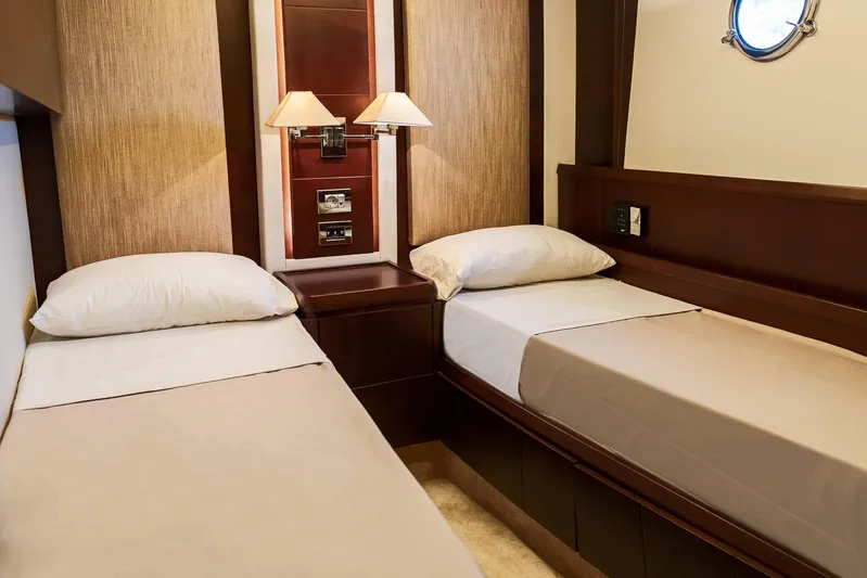 Vea Yacht Photos Pics Twin cabin interior of 2008 Azimut 75 yacht with elegant wood finishes.