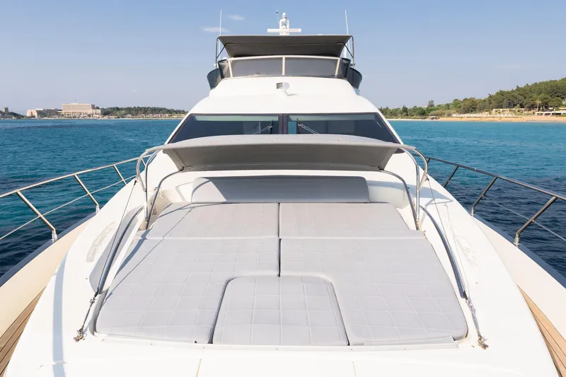 Vea Yacht Photos Pics Luxury Azimut 75 yacht, 2008 model, with spacious sun deck on calm blue waters.