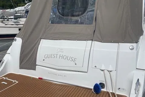  Yacht Photos Pics 2011 Cruisers Yachts 360 Express, "The Guest House," docked with cover, Suttons Bay, MI.