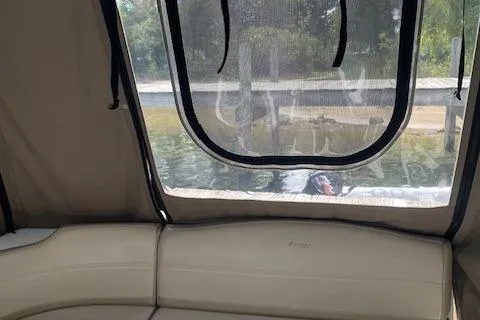  Yacht Photos Pics 2011 Cruisers Yachts 360 Express interior with beige seating and window view.