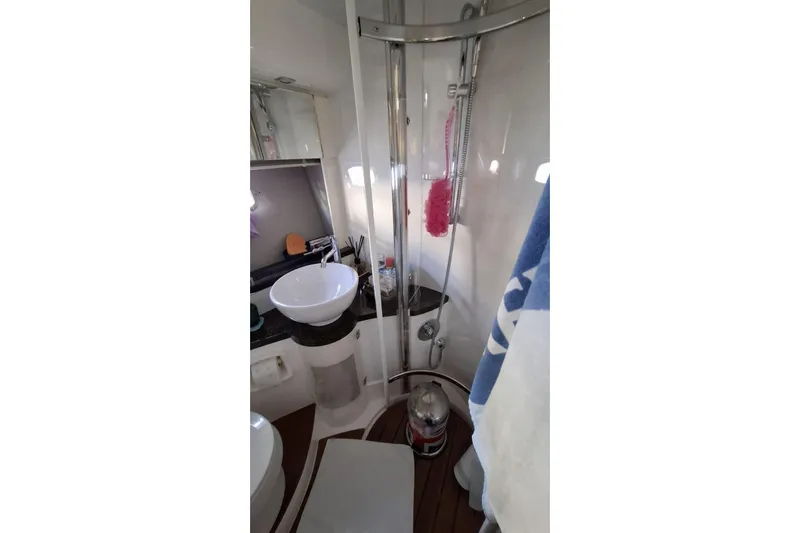  Yacht Photos Pics Bathroom interior of 2009 Fairline Targa 52 MK3 yacht with shower and sink.