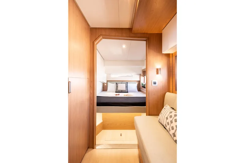  Yacht Photos Pics Luxurious interior of 2026 Bali 4.2 yacht with cozy bedroom and modern design.