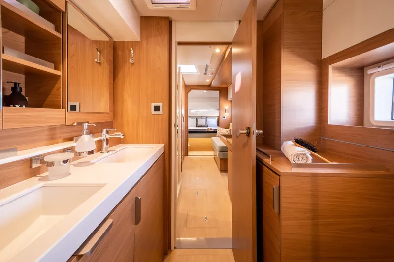  Yacht Photos Pics Luxurious interior of 2026 Bali 4.2 yacht featuring modern wood finishes and elegant design.