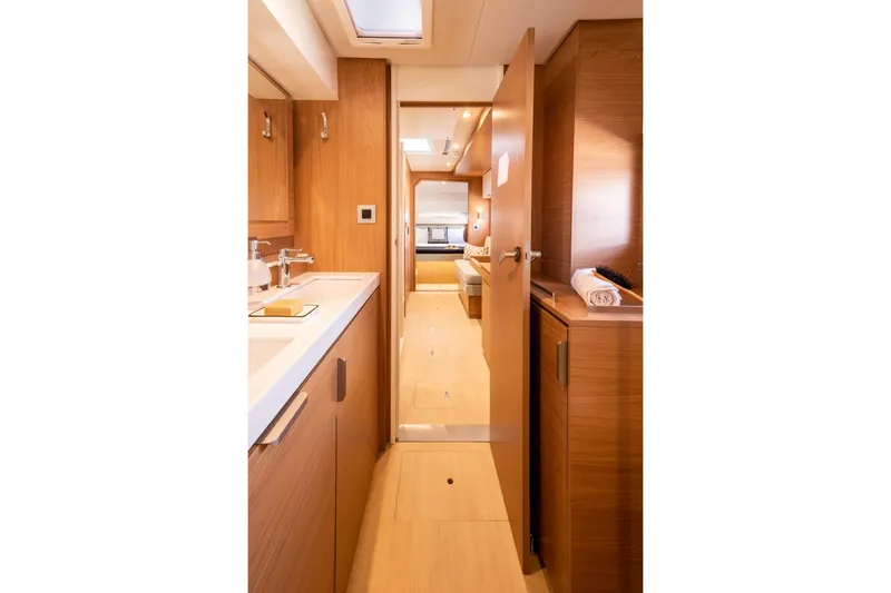  Yacht Photos Pics Luxurious interior of 2026 Bali 4.2 yacht, featuring modern wood finishes and sleek design.