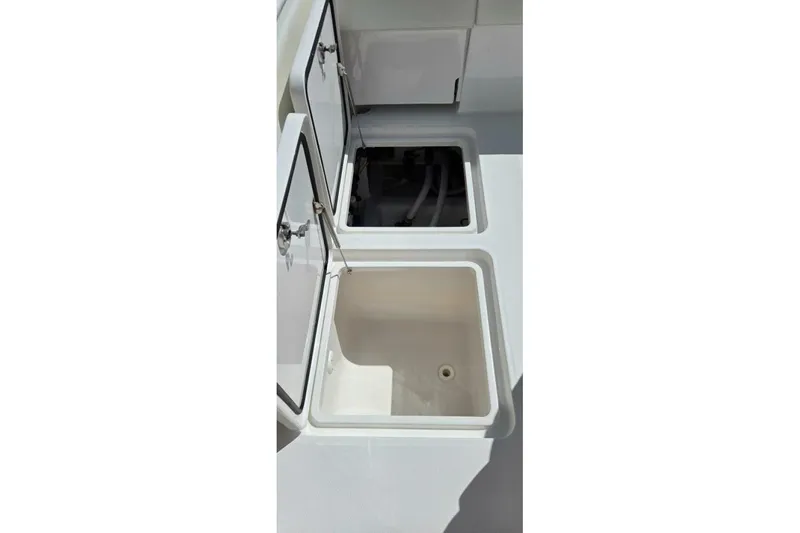 Hit N Run Yacht Photos Pics Open storage compartments on a 2020 Invincible 35 Catamaran boat deck.