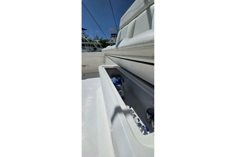 Hit N Run Yacht Photos Pics 2020 Invincible 35 Catamaran with open storage compartment, containing drinks and ice.