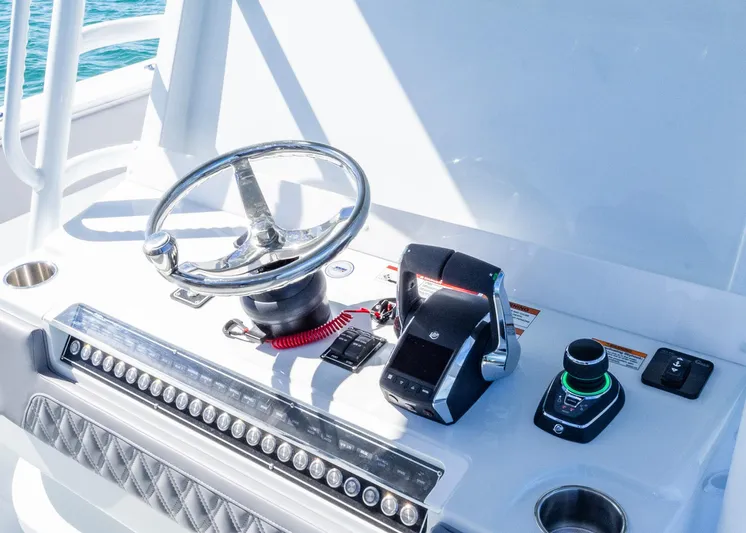  Yacht Photos Pics Helm of 2025 Invincible 39 Open Fisherman with steering wheel and controls.