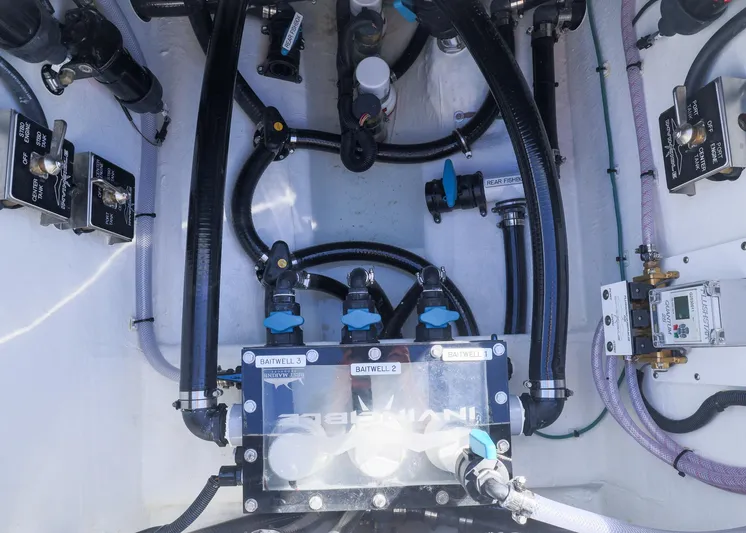 Yacht Photos Pics Engine compartment of 2025 Invincible 39 Open Fisherman with visible hoses and valves.