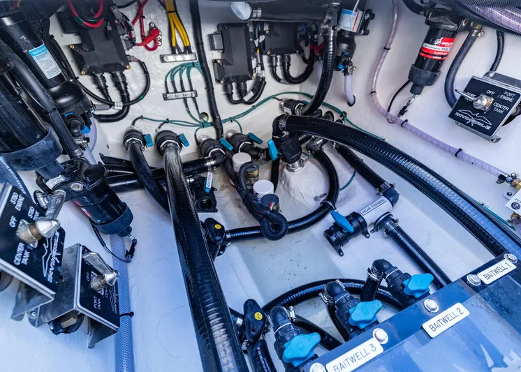  Yacht Photos Pics Engine compartment of 2025 Invincible 39 Open Fisherman with complex wiring and plumbing.