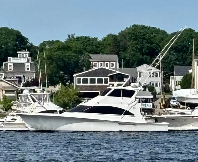 Snow Bank Yacht Photos Pics 2003 Ocean Yachts 62 Enclosed Bridge docked near coastal homes.