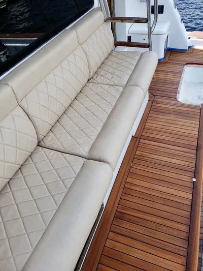 Snow Bank Yacht Photos Pics Luxurious seating on 2003 Ocean Yachts 62 Enclosed Bridge with teak flooring.