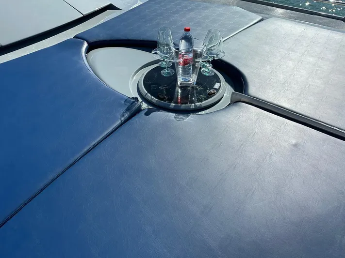  Yacht Photos Pics Luxurious Baia Atlantica 78 yacht deck with bottle and glasses, 2005 model.