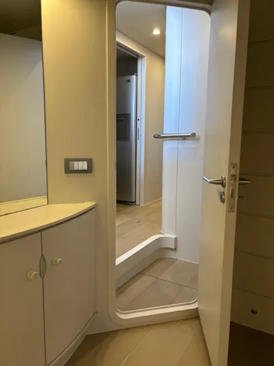  Yacht Photos Pics Interior of 2005 Baia Atlantica 78 yacht, featuring modern design and sleek cabinetry.