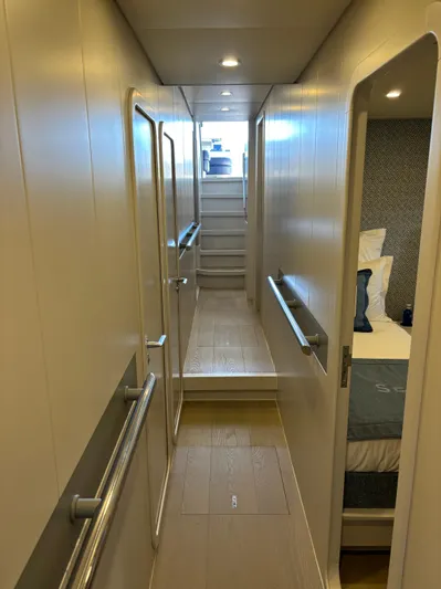  Yacht Photos Pics Hallway inside 2005 Baia Atlantica 78 yacht, featuring modern design and cozy bedroom view.