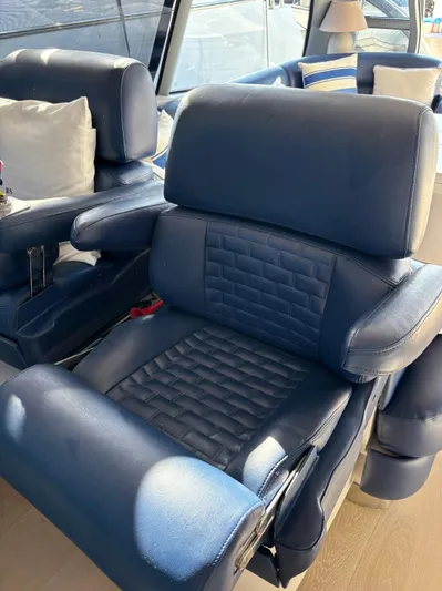  Yacht Photos Pics Luxurious blue leather seating on 2005 Baia Atlantica 78 yacht interior.