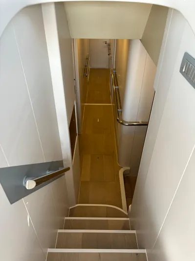  Yacht Photos Pics Staircase inside 2005 Baia Atlantica 78 yacht, featuring sleek modern design.