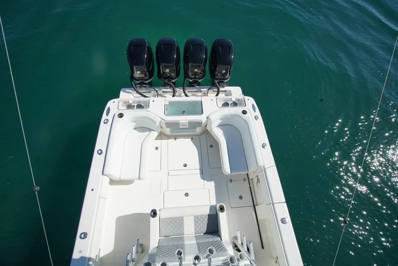 Simply Knot II Yacht Photos Pics 2018 SeaVee 390Z boat with four outboard engines, viewed from above on clear water.