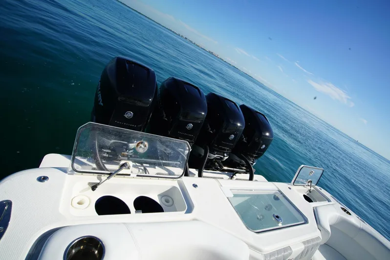 Simply Knot II Yacht Photos Pics 2018 SeaVee 390Z boat with four powerful outboard engines on open water.