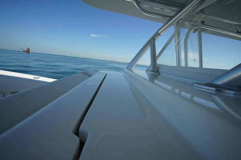 Simply Knot II Yacht Photos Pics 2018 SeaVee 390Z boat on calm ocean with clear blue sky.