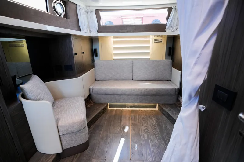  Yacht Photos Pics Interior of 2025 Cranchi A46 Luxury Tender, featuring modern seating and elegant design.