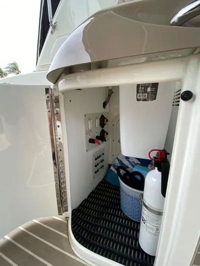  Yacht Photos Pics 2017 Formula 350 Sun Sport storage compartment with safety equipment.