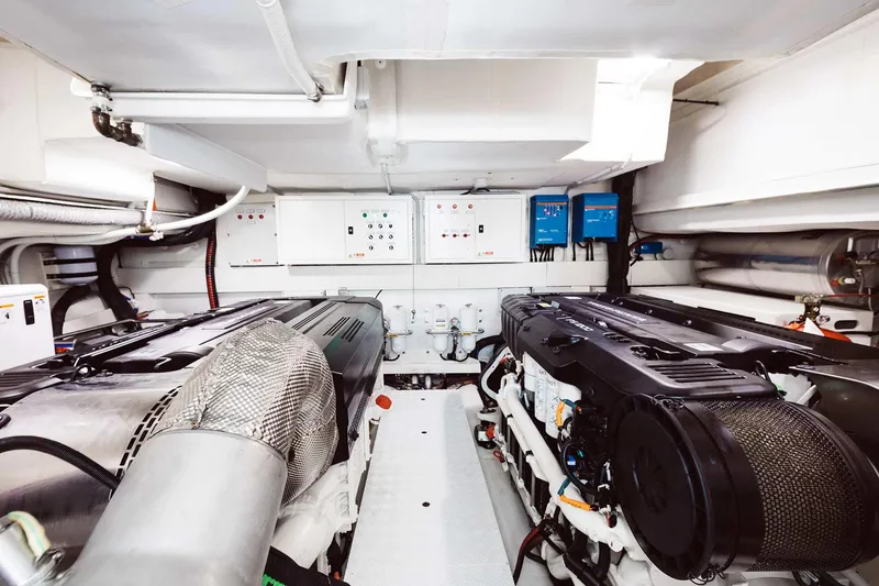 Bluegame 62 Yacht Photos Pics Engine room of 2019 Bluegame BG62 yacht with dual engines and control panels.