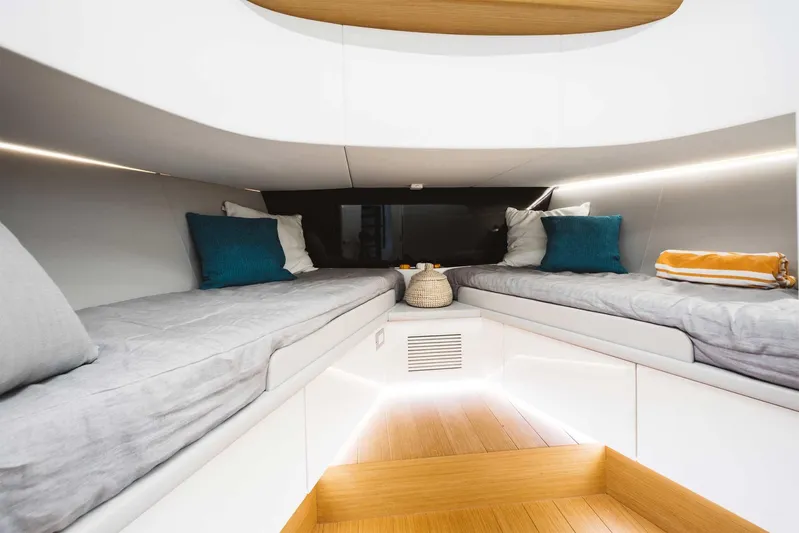 Bluegame 62 Yacht Photos Pics Interior cabin of 2019 Bluegame BG62 yacht with twin beds and modern design.